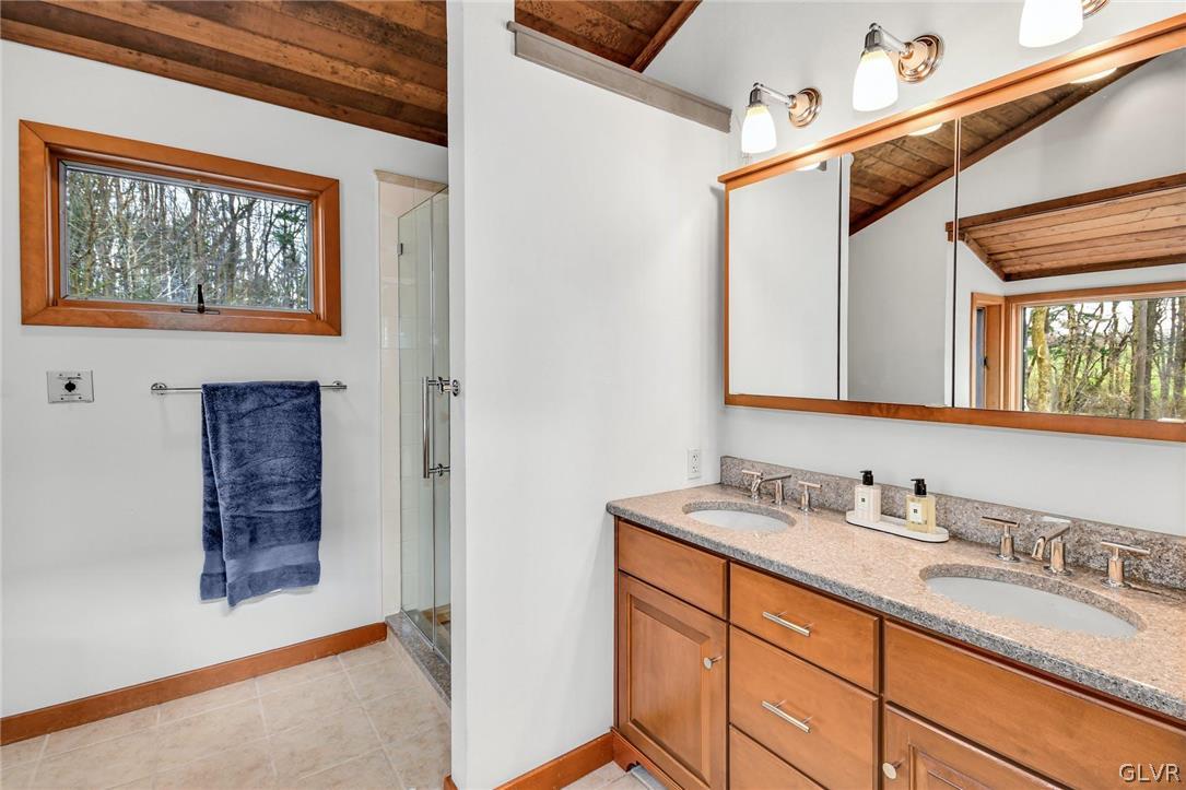 290 Steely Hill Road Riegelsville, PA 18077 - Photo 25 of 33 a bathroom with a sink and a mirror