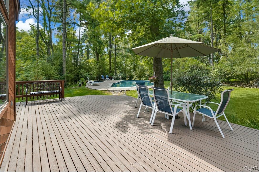 290 Steely Hill Road Riegelsville, PA 18077 - Photo 28 of 33 a view of a chairs and table on the wooden deck