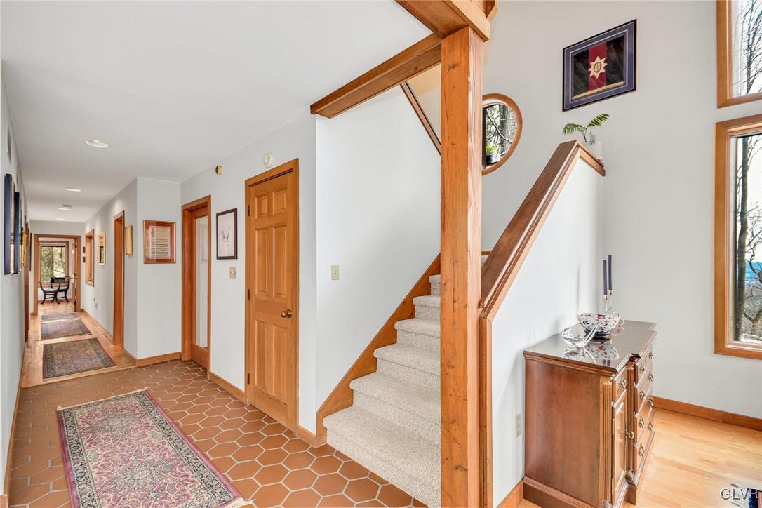 290 Steely Hill Road Riegelsville, PA 18077 - Photo 4 of 33 a view of an entryway with wooden floor and stairs