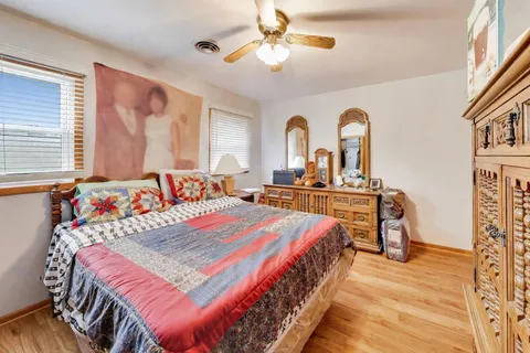 a room with gym equipment and a large window