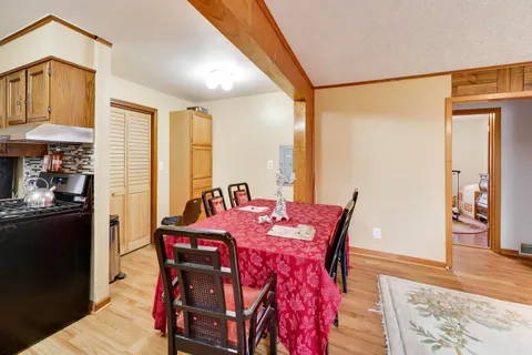 a bed room with bed and a chandelier