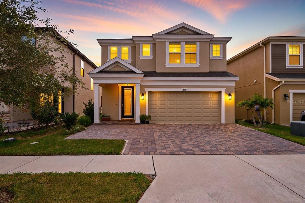 17880 Moon Rise Pass Land O Lakes, FL 34638 - Photo 1 of 43 a front view of a house