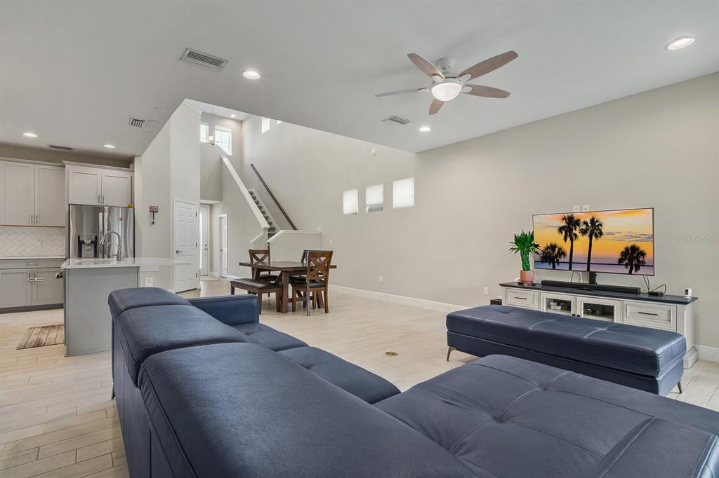 17880 Moon Rise Pass Land O Lakes, FL 34638 - Photo 14 of 43 a living room with furniture and kitchen view
