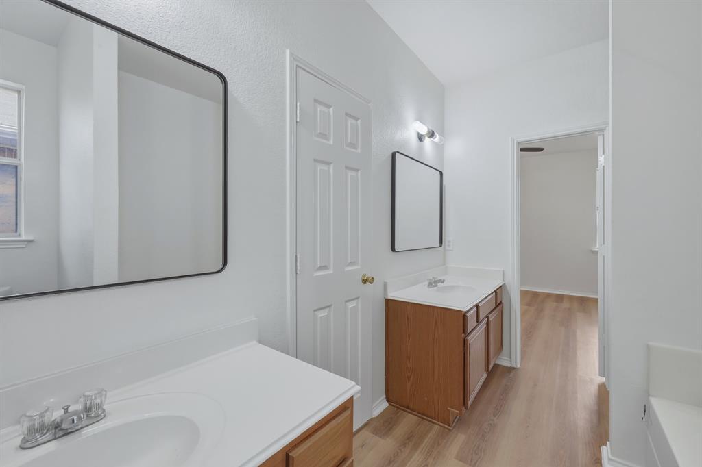 13509 Ponderosa Ranch Road Fort Worth, TX 76262 - Photo 24 of 33 Dual vanities and sinks.