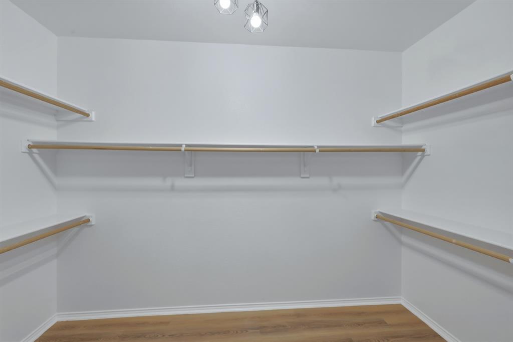 13509 Ponderosa Ranch Road Fort Worth, TX 76262 - Photo 27 of 33 Large primary closet.