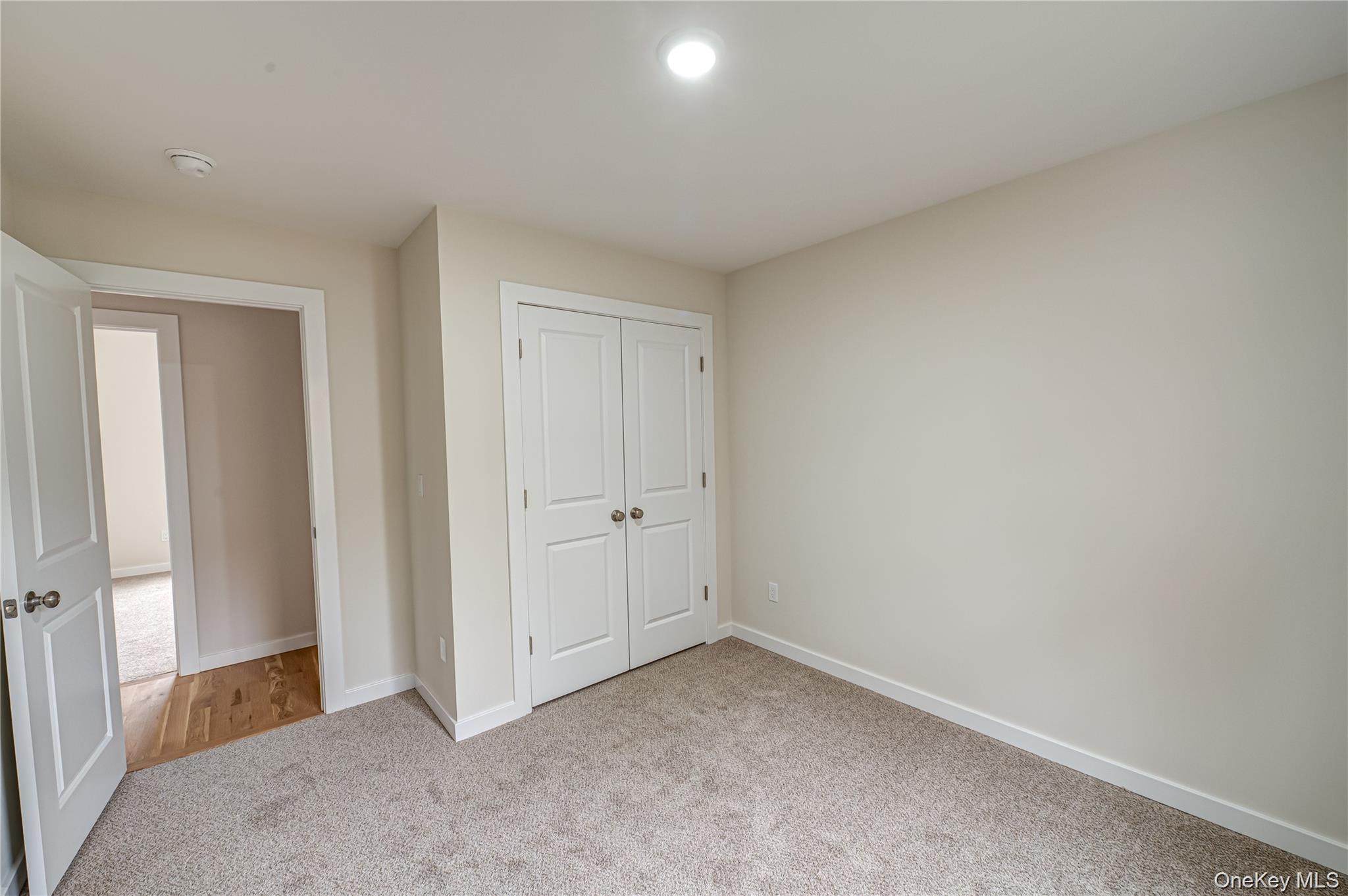 370 Canal Road Port Jefferson Station, NY 11776 - Photo 13 of 16 a view of an empty room and a window