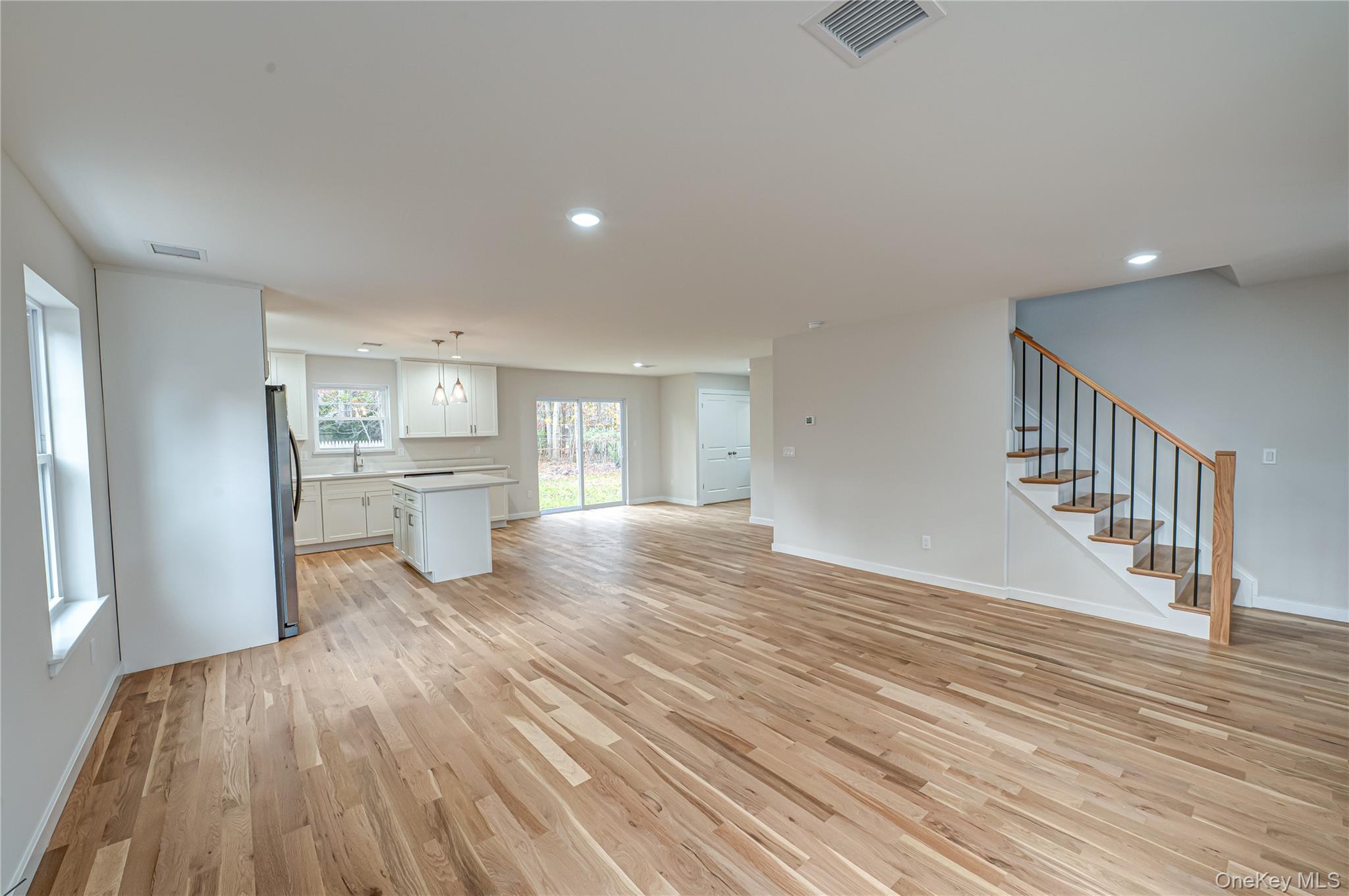 370 Canal Road Port Jefferson Station, NY 11776 - Photo 3 of 16 a view of kitchen and wooden floor