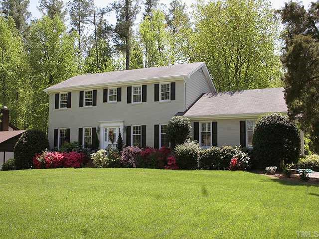 7105 Tanbark Way Raleigh, NC 27615 - Photo 1 of 1 a view of a house with garden and yard