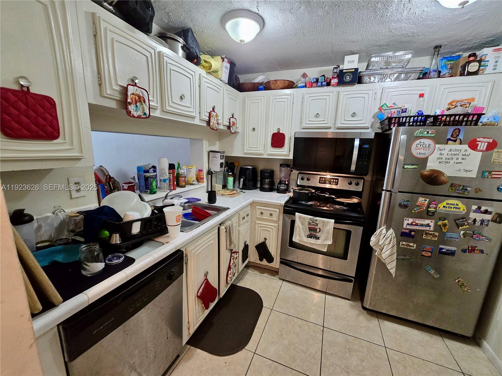 498 Northwest 165th Street, Unit D405 Miami, FL 33169 - Photo 2 of 9