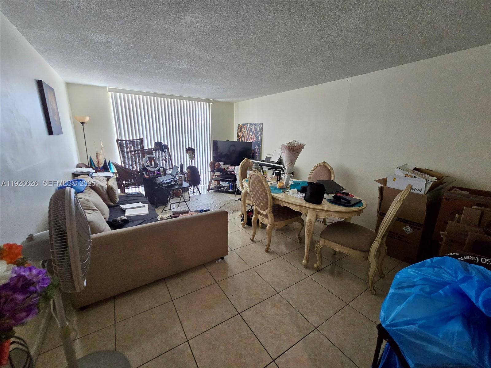 498 Northwest 165th Street, Unit D405 Miami, FL 33169 - Photo 3 of 9