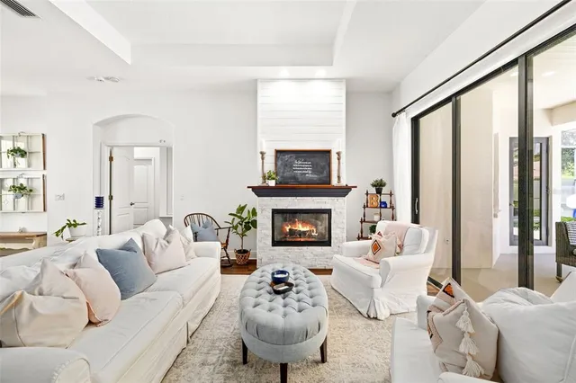 a kitchen with stainless steel appliances granite countertop a refrigerator stove and sink