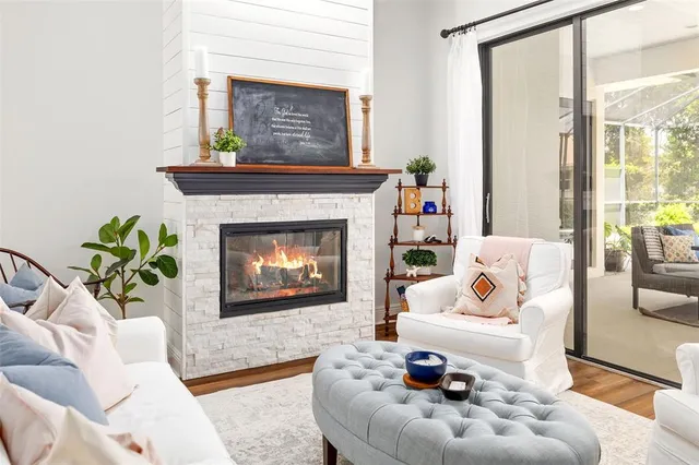 a kitchen with granite countertop kitchen island white cabinets and white appliances