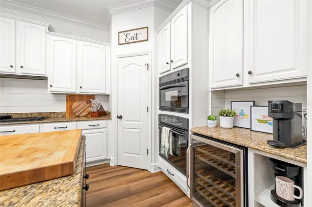 a reading room with furniture and book shelf