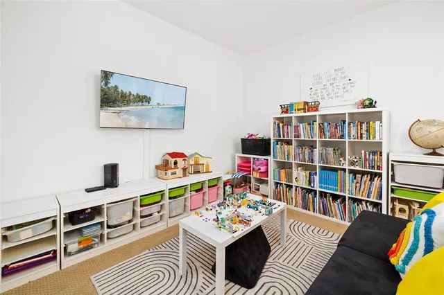 a front view of a building with garden