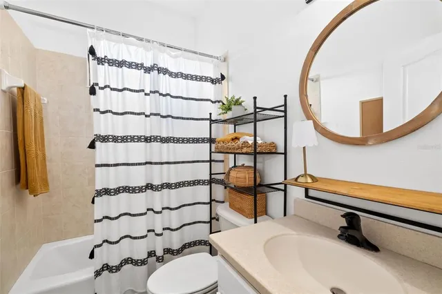 a view of a trees in front of a big yard