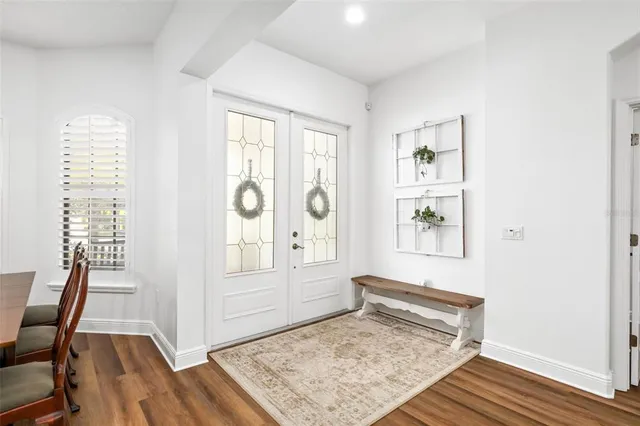 a view of a dining room with furniture window and outside view