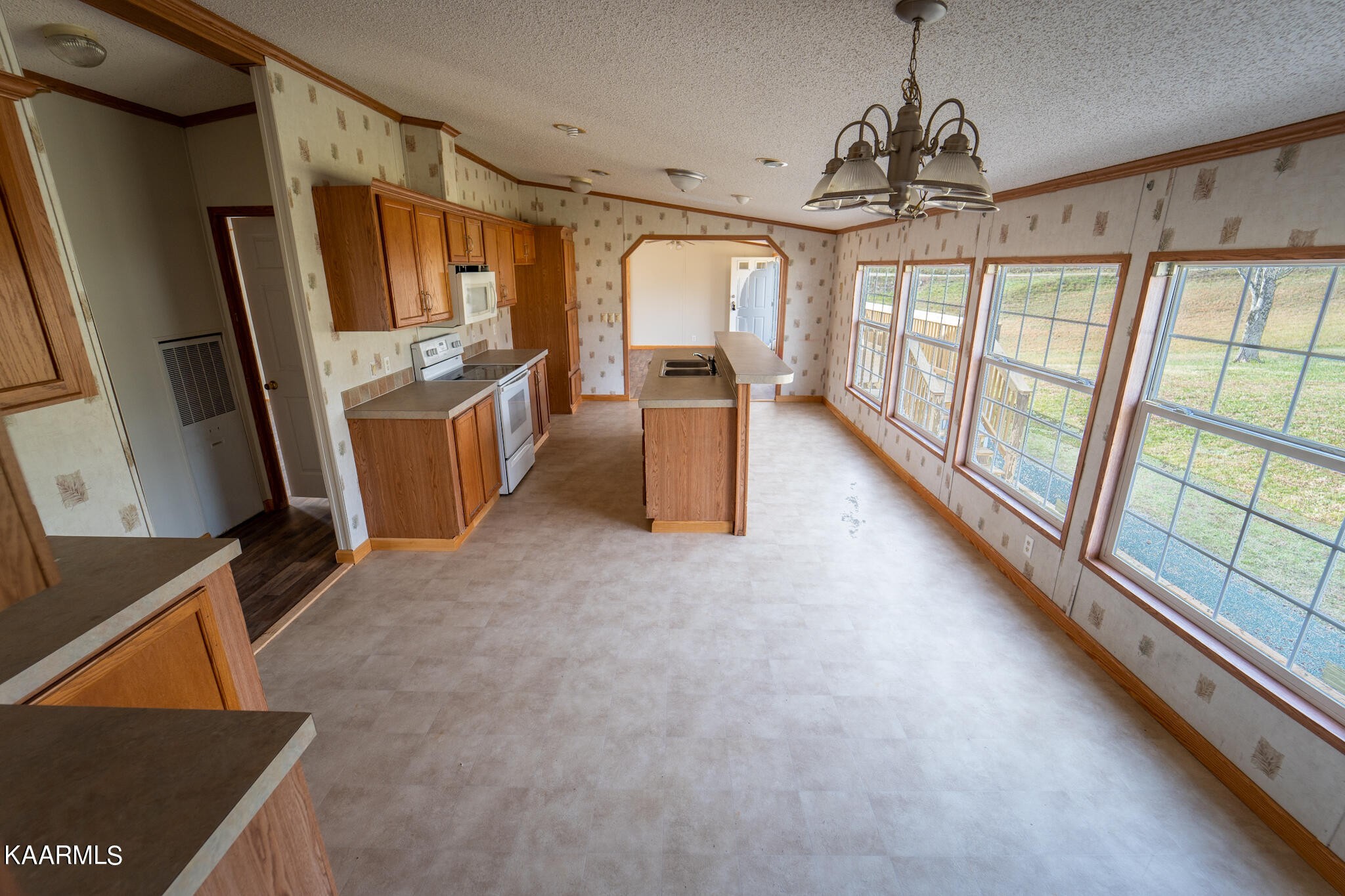 560 Meadowview Road Mosheim, TN 37818 - Photo 12 of 23 a view of a refrigerator and window in an empty room