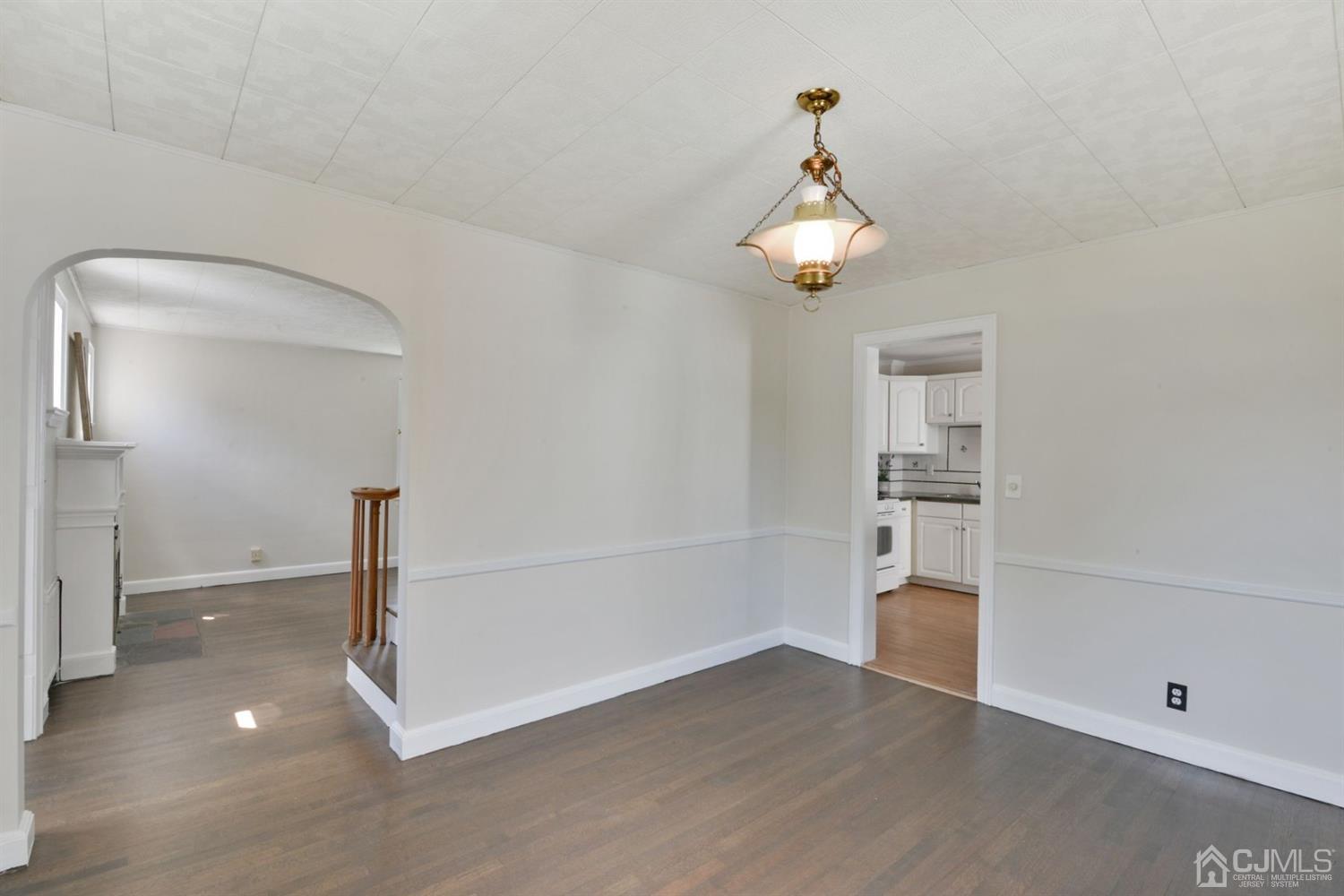 120 Harvard Road Linden, NJ 07036 - Photo 6 of 19 a view of empty room with wooden floor