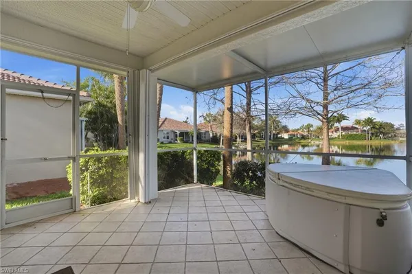a room with water heater and a floor to ceiling window