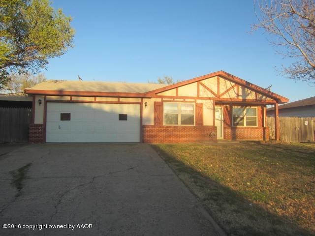 4403 South Austin Street Amarillo, TX 79110 - Photo 1 of 14 a view of a house with a yard