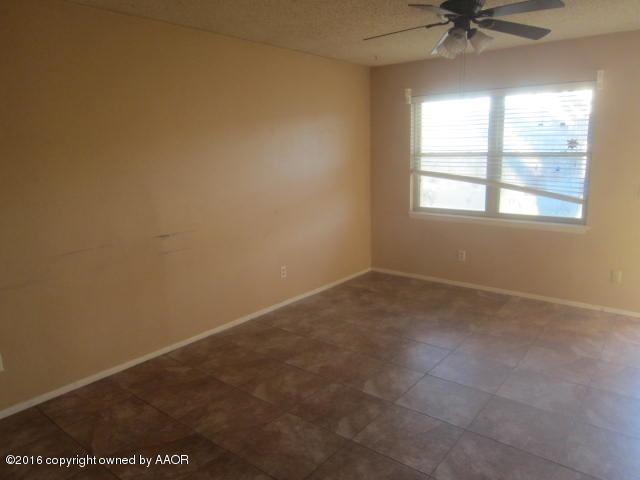 4403 South Austin Street Amarillo, TX 79110 - Photo 5 of 14 an empty room with a window
