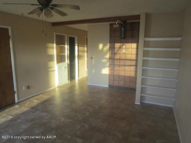 4403 South Austin Street Amarillo, TX 79110 - Photo 6 of 14 a view of a hallway with a window
