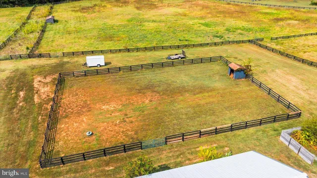 a view of a swimming pool with a lounge chair