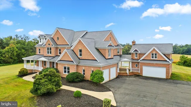 a bedroom with furniture and a flat screen tv