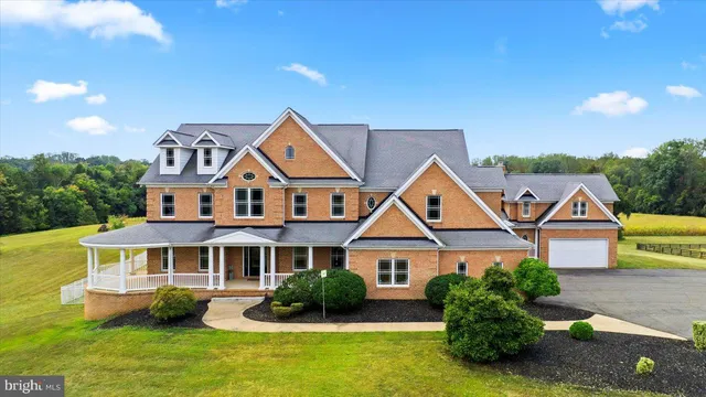 a bathroom with a sink toilet and a mirror