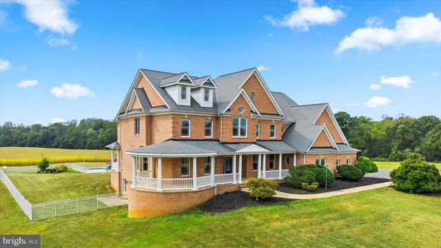 a view of a hallway with a chandelier