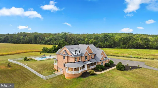a view of a porch with wooden floor
