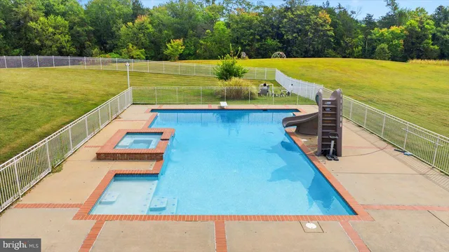 a spacious bathroom with a double vanity sink mirror and double