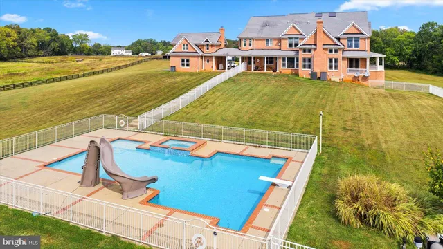 a bathroom with a sink vanity and a mirror