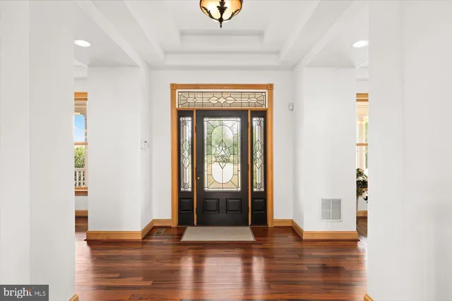 a bathroom with a sink a toilet and shower curtain