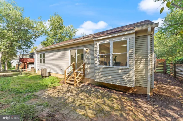 a backyard of a house with seating space