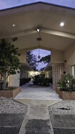 a view of a backyard of a house