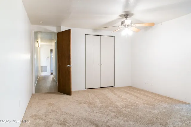 a bathroom with a bathtub and a toilet