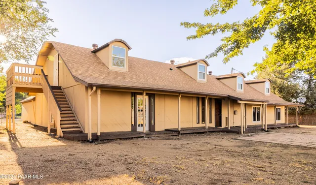 a view of back yard from a room