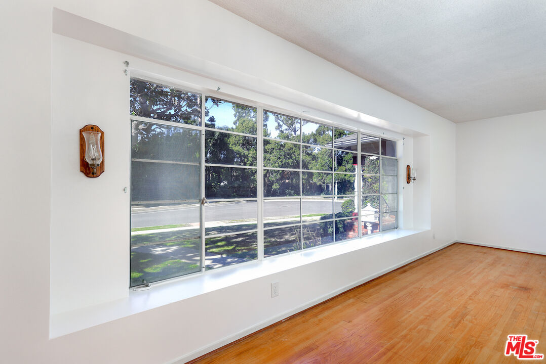 10310 Cullman Avenue Whittier, CA 90603 - Photo 18 of 30 a view of empty room with windows