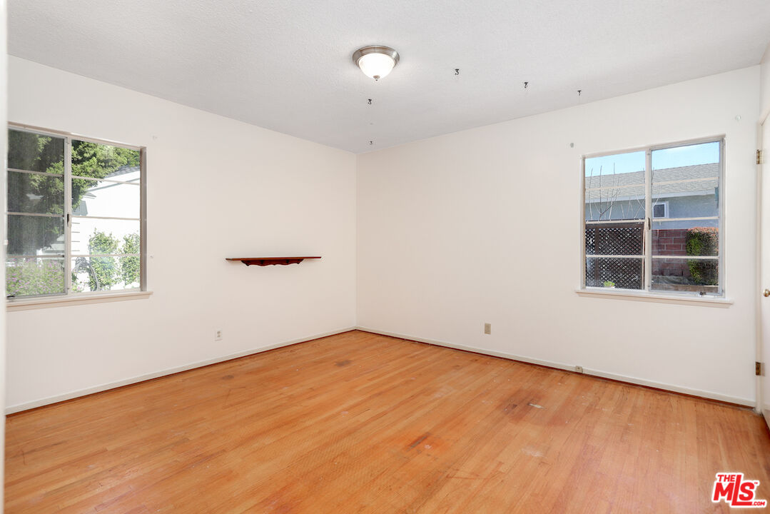 10310 Cullman Avenue Whittier, CA 90603 - Photo 23 of 30 an empty room with a window