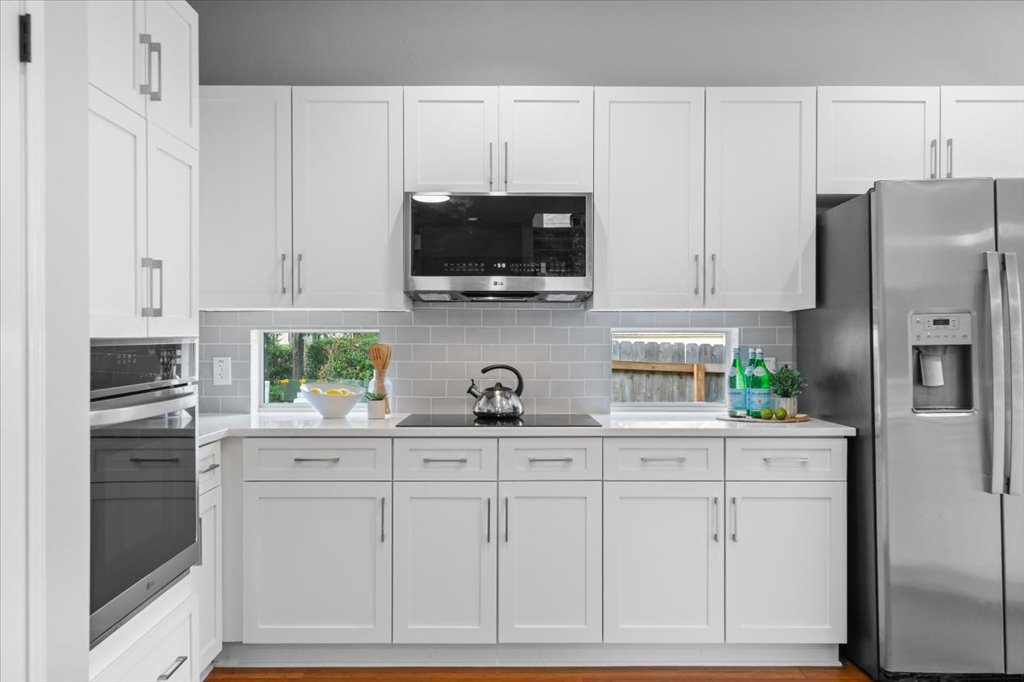 10801 Beachmont Lane Austin, TX 78739 - Photo 5 of 40 Your dream kitchen remodeled in all the right finishes!