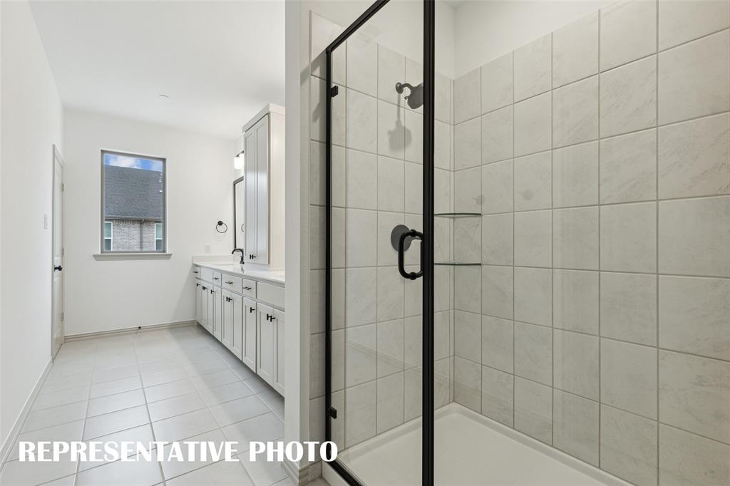 220 Dylan Way Midlothian, TX 76065 - Photo 8 of 16 Your new owner's bath comes complete with an oversized, walk in shower. REPRESENTATIVE PHOTO
