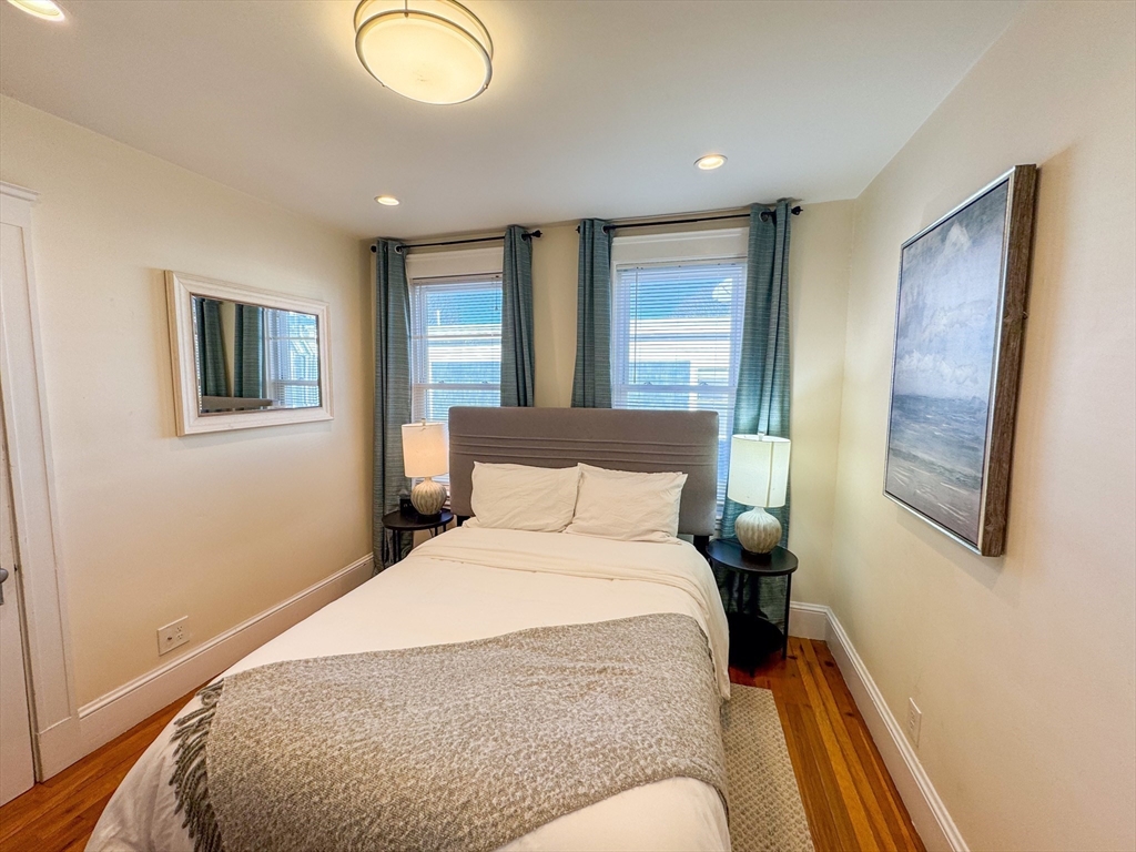 30 Clay Street, Unit 3FURNISHED Cambridge, MA 02140 - Photo 9 of 14 a bedroom with a large bed and a window