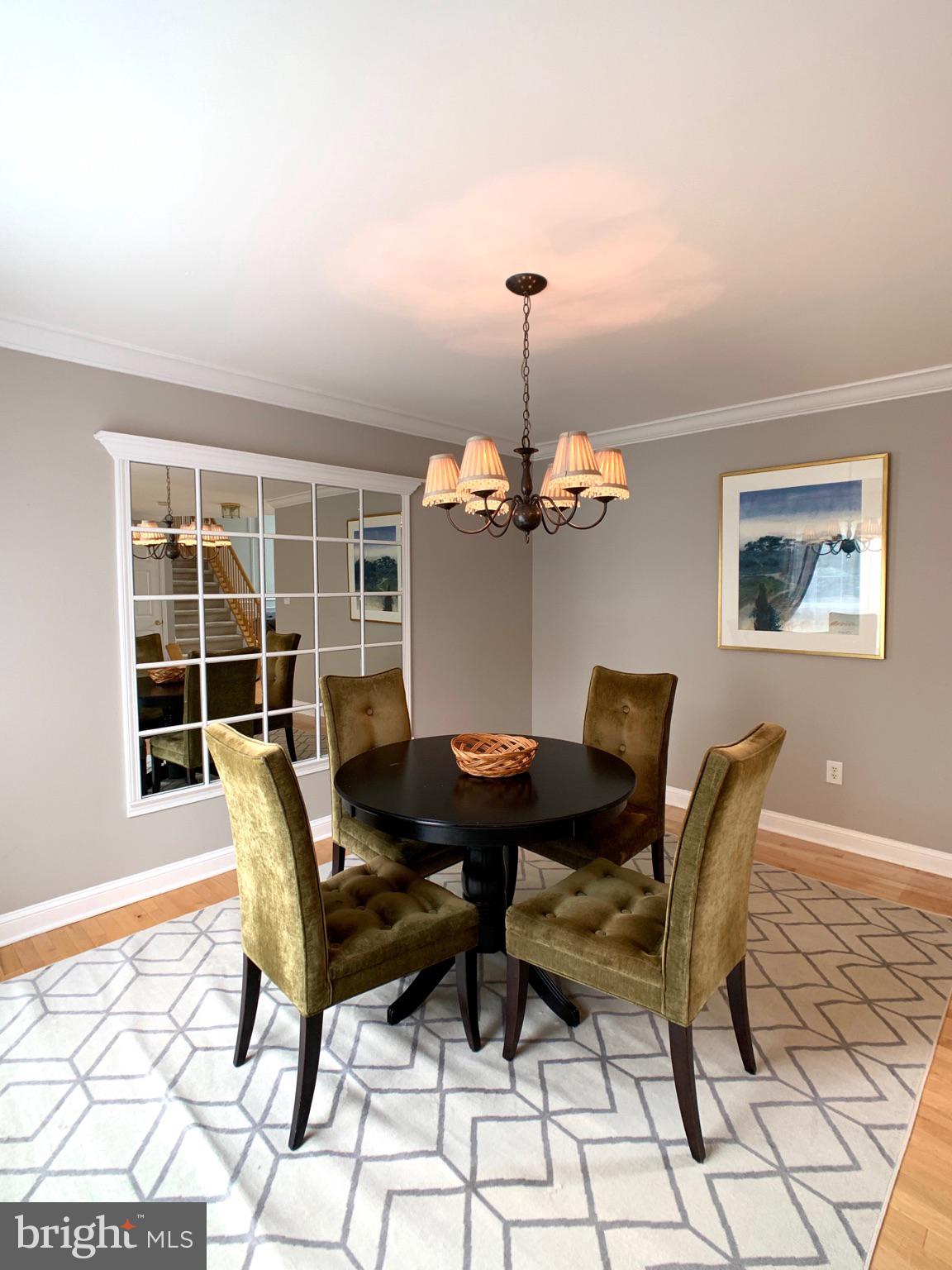 128 Coburn Road Pennington, NJ 08534 - Photo 11 of 39 Dining room with modern chandelier
