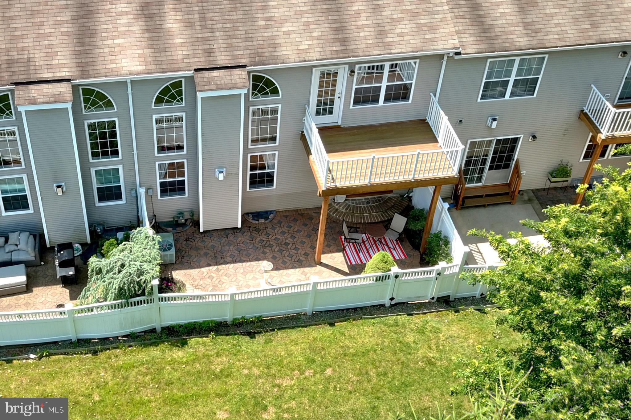 128 Coburn Road Pennington, NJ 08534 - Photo 21 of 39 Balcony off the master bedroom & Full paver patio