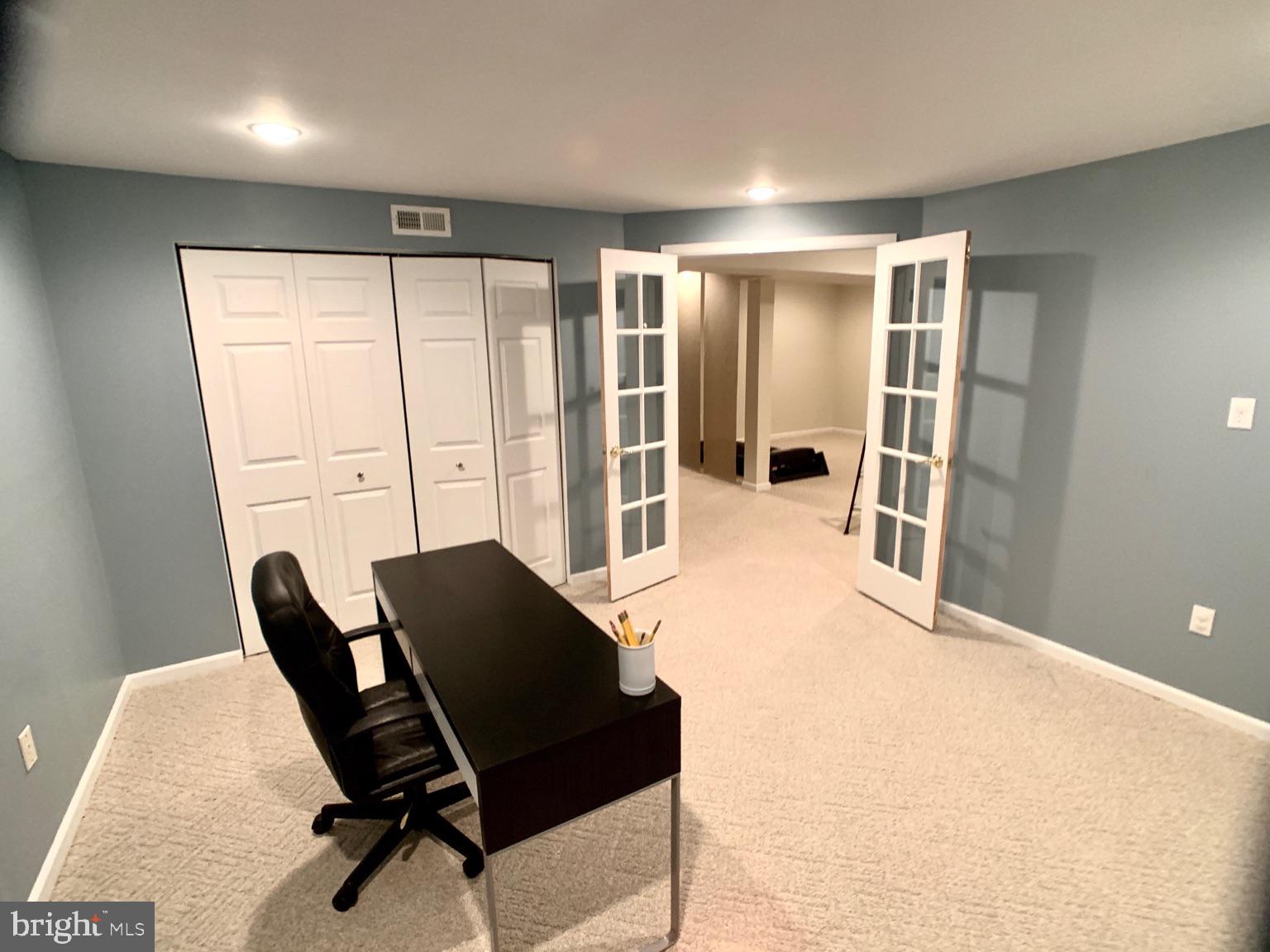 128 Coburn Road Pennington, NJ 08534 - Photo 33 of 39 Finished Basement room with French Doors