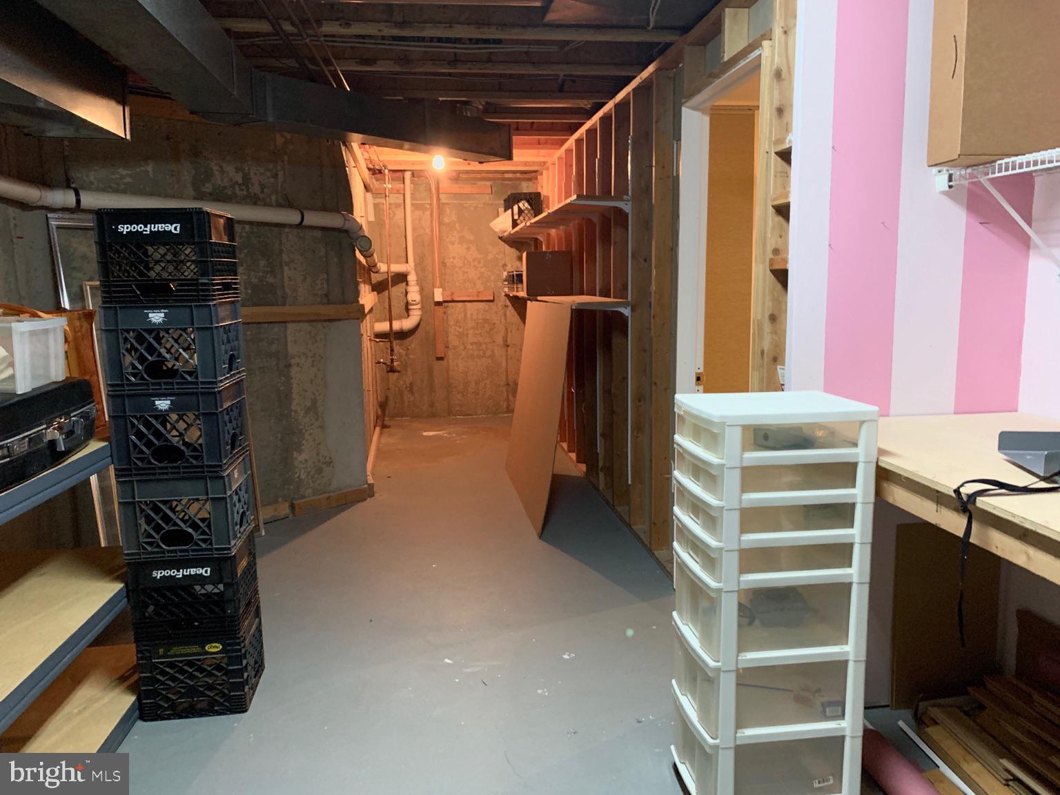 128 Coburn Road Pennington, NJ 08534 - Photo 34 of 39 Basement storage