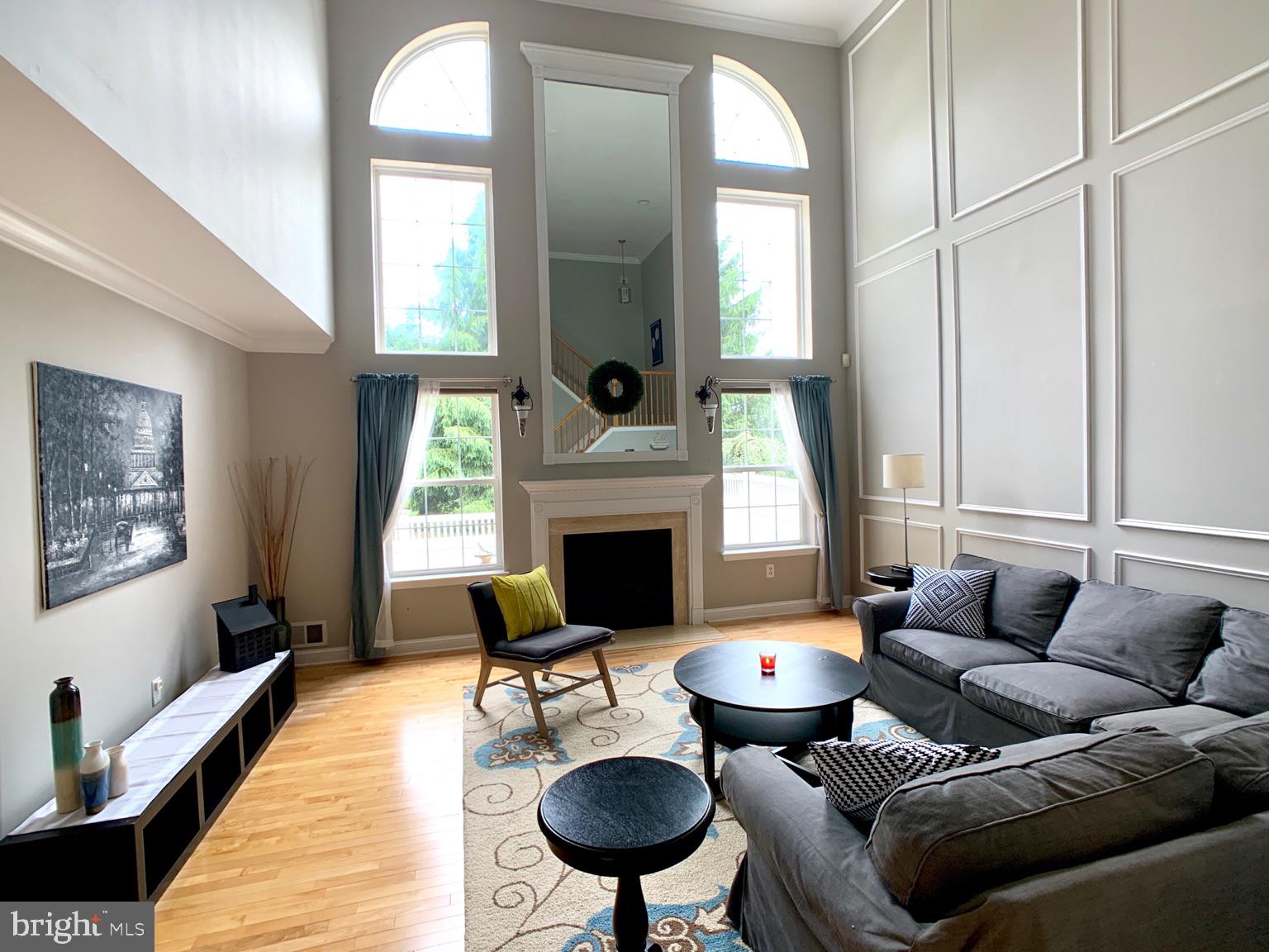 128 Coburn Road Pennington, NJ 08534 - Photo 8 of 39 Living Room with 2 story windows