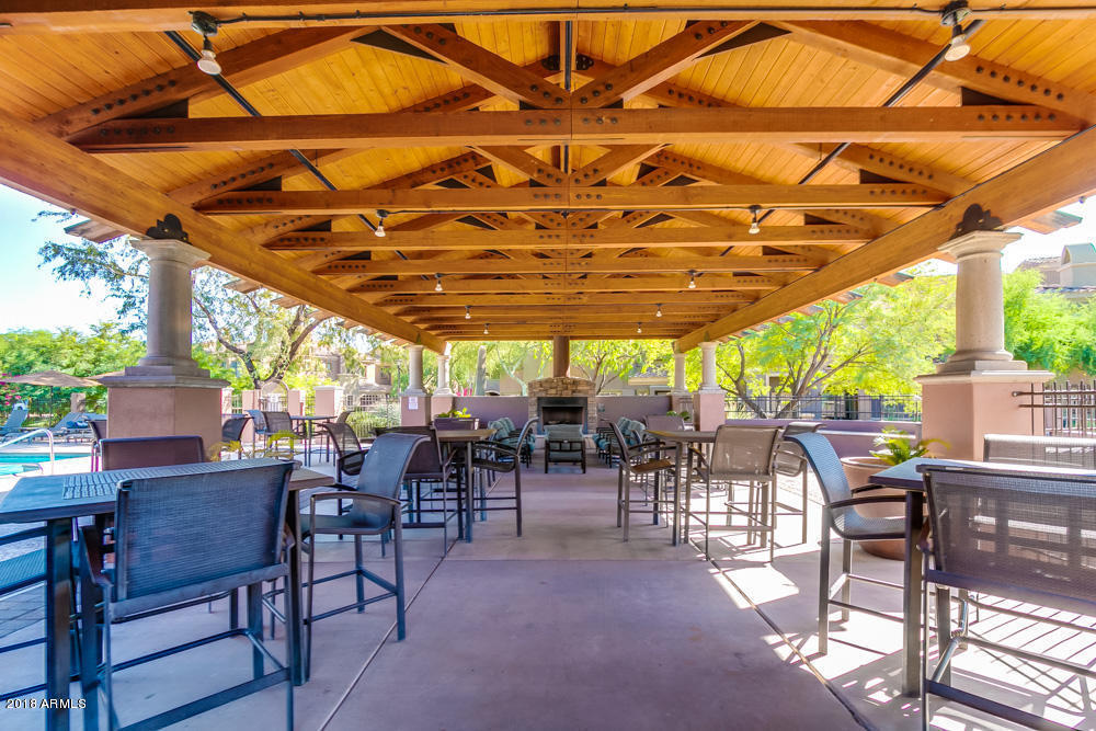 3935 East Rough Rider Road, Unit 1009 Phoenix, AZ 85050 - Photo 23 of 27 Community Poolside