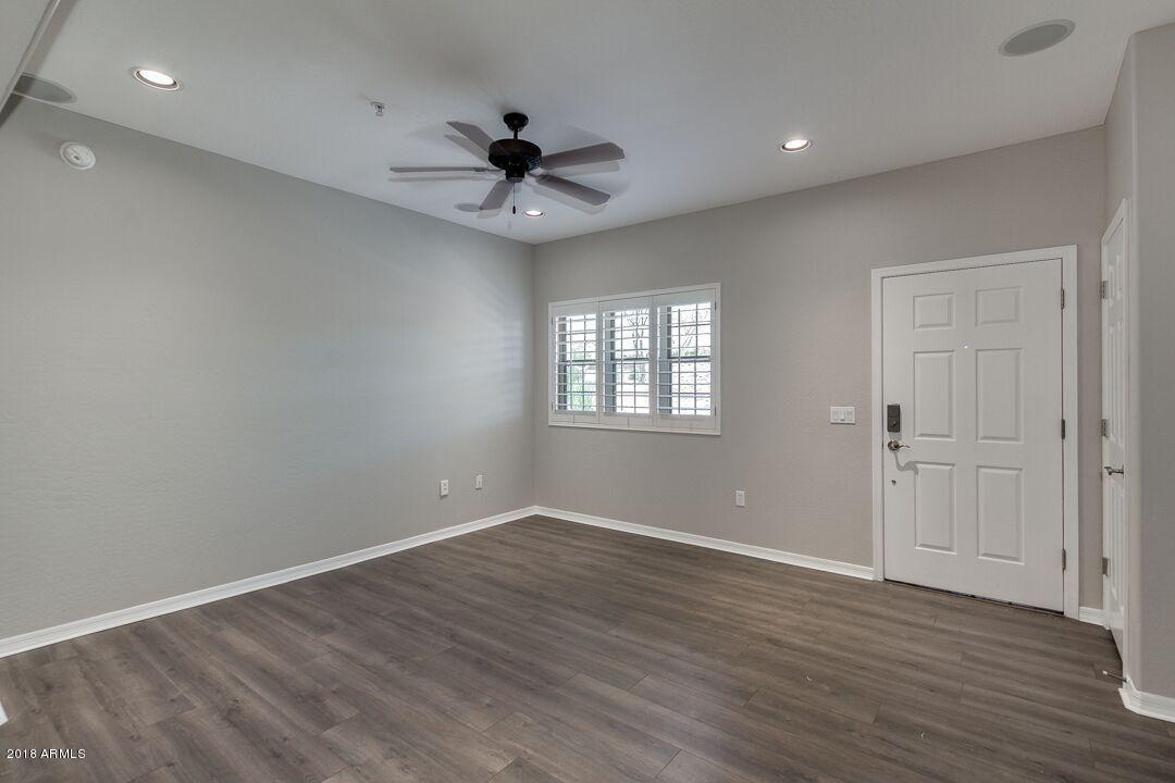 3935 East Rough Rider Road, Unit 1009 Phoenix, AZ 85050 - Photo 8 of 27 Living Room